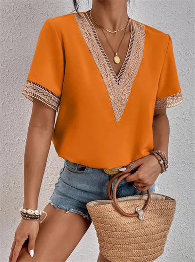 Damen Sommerbluse mit V-Ausschnitt und bestickten Details