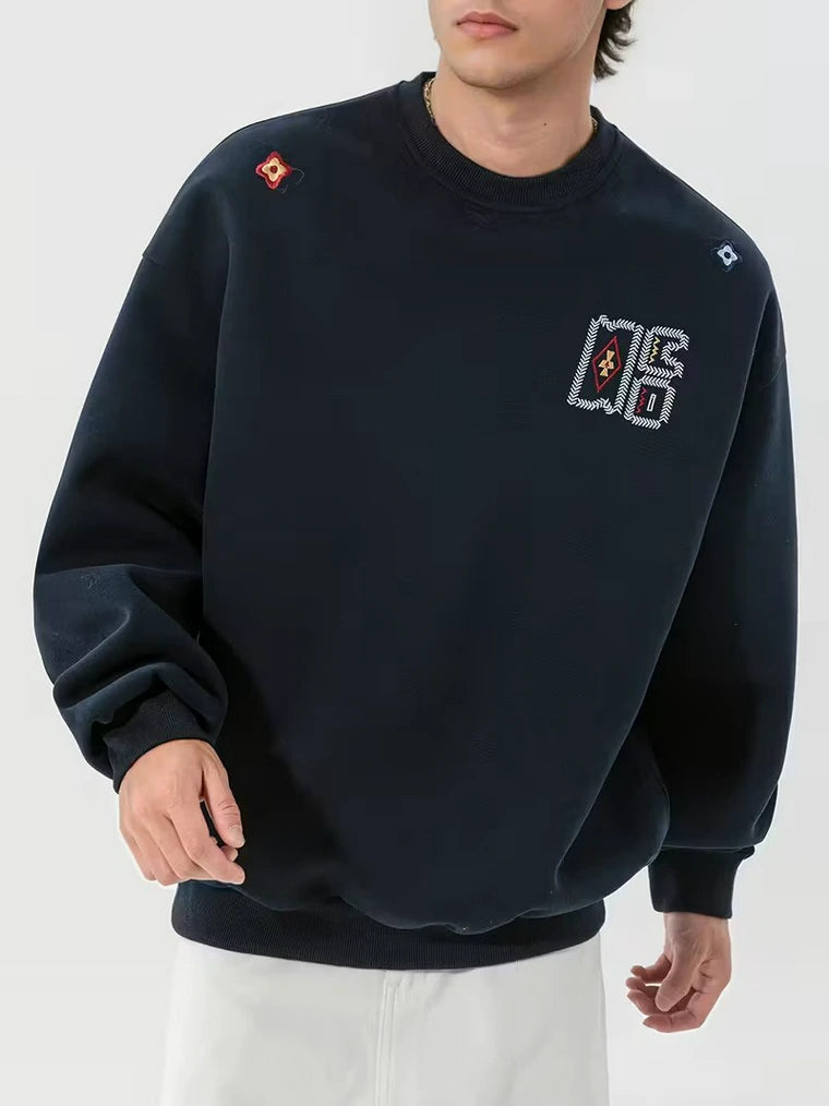 Herren Rundhals-Pullover mit Stickapplikationen und Geripptem Saum